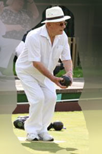 Derek denbow bowling in Whites.